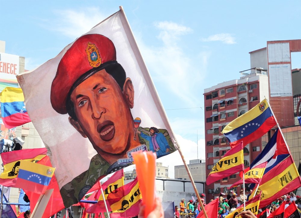 shutterstock_1034959132_-_chavez_flag_at_rally.jpg