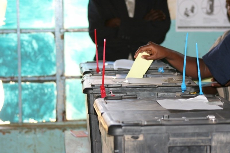 A voter casts a ballot in Kenya in 2007. The 2007 election saw a great deal of post-election violence, in part because of issues with the electoral body. Photo by Juliana Rotich, via Flickr. Creative Commons.