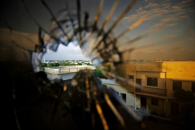 LIGHT AHEAD: A view out of the window of a Mogadishu hotel. UN Photo/Stuart Price, via Flickr. Creative Commons.