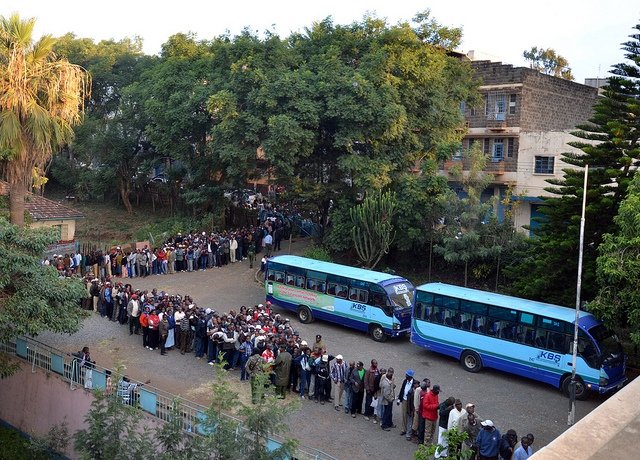 Citizens line up to vote in the 2013 Kenyan elections. Photo by Commonwealth Secretariat, via Flickr. Creative Commons.