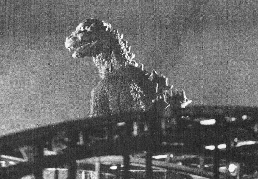 A behind the scenes shot of the 1954 Tōhō film Gojira, showing the original Godzilla as an ancient radiation-breathing monster awakened by the hydrogen bomb. Released months after the Lucky Dragon accident during the Castle Bravo test, the movie spoke to Japan's victimization by nuclear weapons.