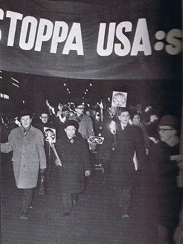 Swedish leader Olof Palme demonstrates against the war with the North Vietnamese ambassador to Moscow during a a torchlight march, February 1968. Source: Public Domain. Arbetarrörelsens arkiv, via WikiCommons.