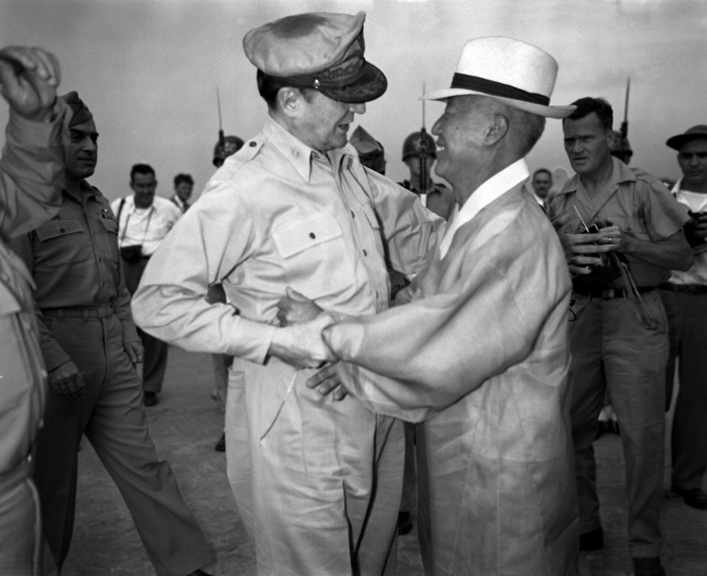 Syngman Rhee (left) greets US General Douglas MacArthur at Kimpo Air Force Base.