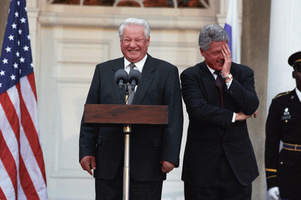 resident William J. Clinton and President Boris Nikolayevich Yeltsin delivering a joint press statement on the steps of Springwood, Franklin Delano Roosevelt's historic home in Hyde Park, New York. The image was photographed by Ralph Alswang.