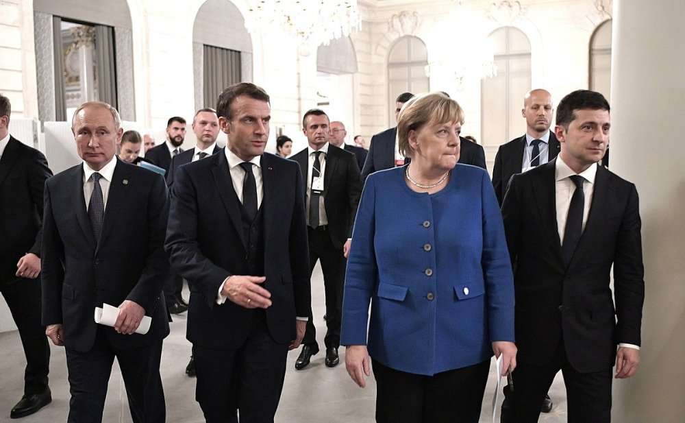 A press conference with Vladimir Putin, Emmanuel Macron, Angela Merkel, and Volodymyr Zelenskyy following the Normandy Format