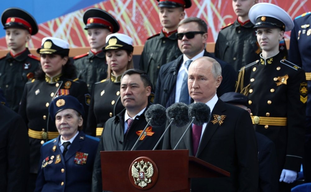 President Putin surrounded by military officers