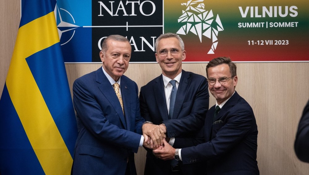 President Recep Tayyip Erdoǧan of Türkiye, Prime Minister Ulf Kristersson of Sweden, and NATO Secretary General Jens Stoltenberg after reaching an agreement ahead of NATO Summit in Vilnius, July 2023