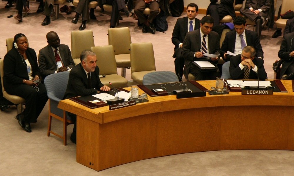 People sitting around desk in UN Security Council