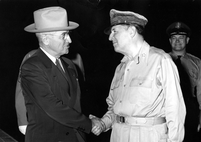 President Harry S. Truman and General Douglas MacArthur at President Truman's arrival at the Wake Island Conference, October 15, 1950.