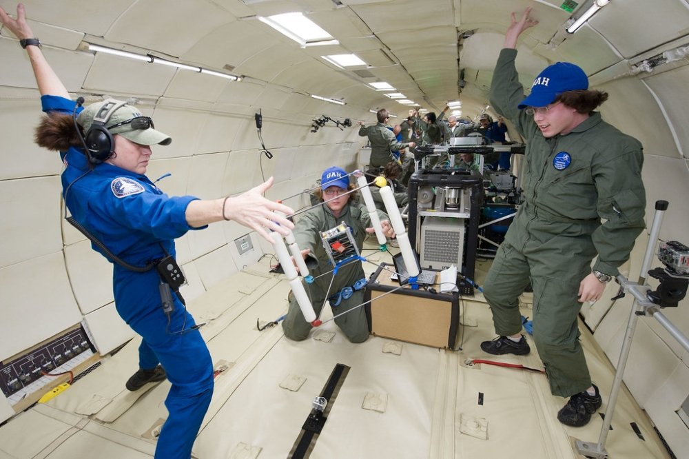 People floating around a Cubesat