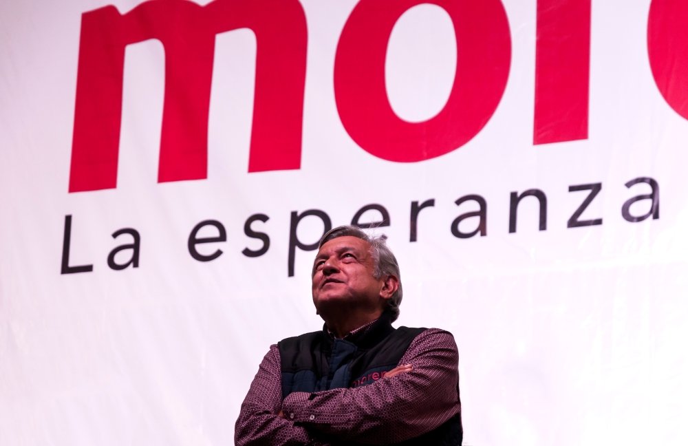 AMLO looking up.