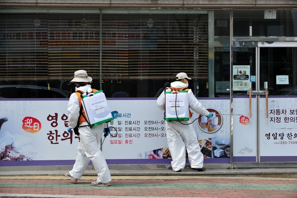 Volunteers from Pohang City are conducting COVID-19 disinfection on the morning of March 15, 2020, in Ocheon-eup, Pohang-si, North Gyeongsang Province, South Korea.