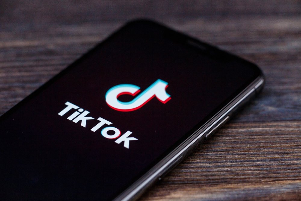 A cell phone displaying the TikTok logo