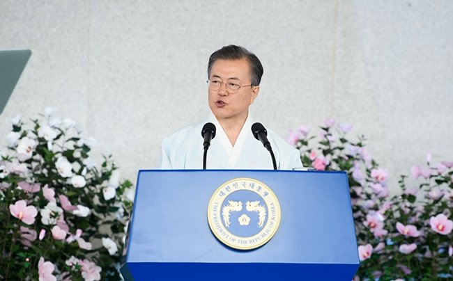 Presdient Moon Jae-In at a podium giving a speech.