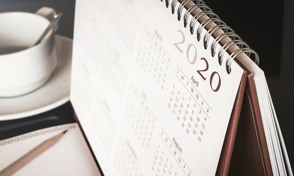 A close up of a desk calendar with the year 2020 visible