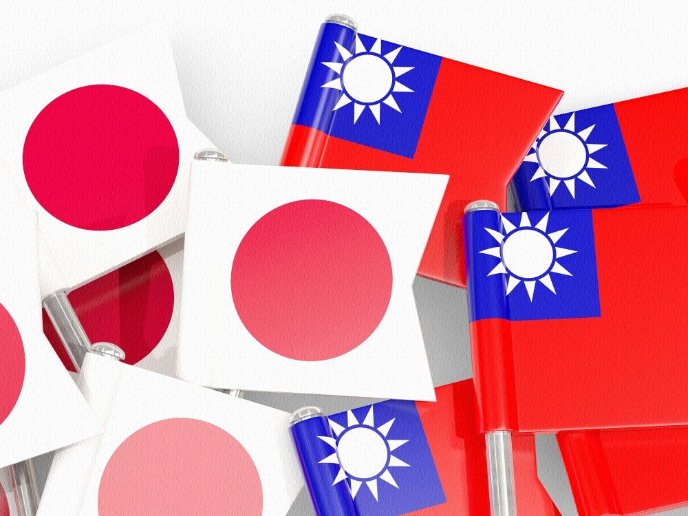 Small flags from Japan and Taiwan on a white background