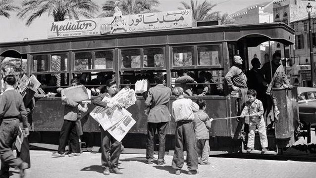 Children selling newspapers in Beirut, 1956