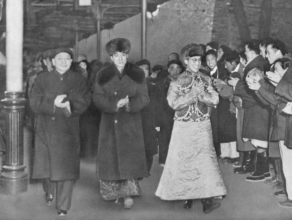 Deng Xiaoping (far left) greeting 14th Dalai Lama (centre right) and 10th Panchen Lama, 1954