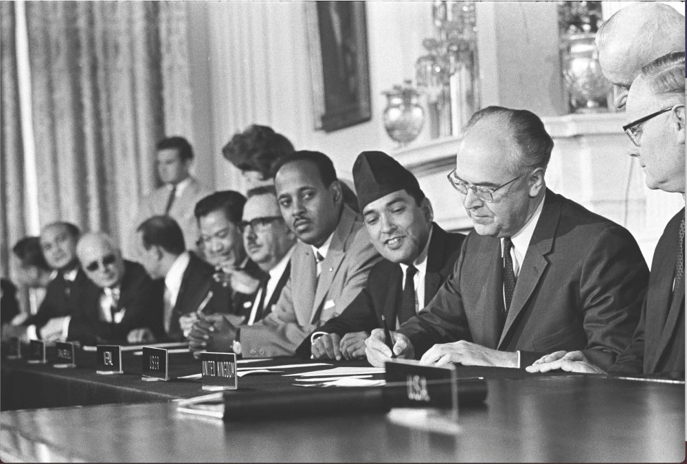 Soviet ambassador Anatoli Dobrynin signs the NPT in 1968