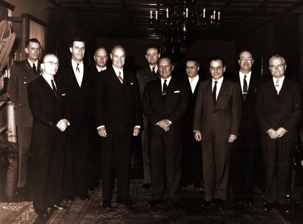 George F. Kennan, American diplomat and historian, posing with others.