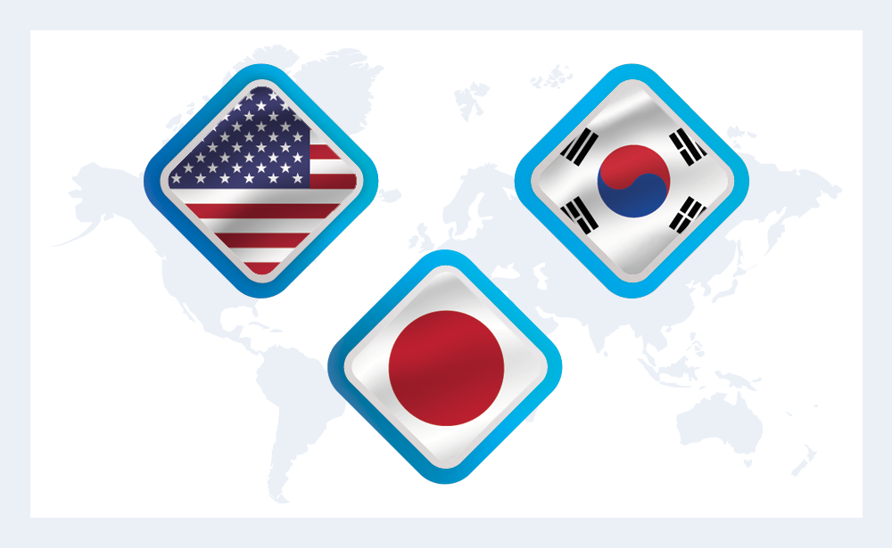 A map of the world with graphics representing the flags of the United States, Japan, and South Korea