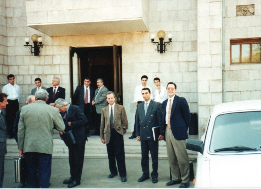 Keays standing with other diplomats