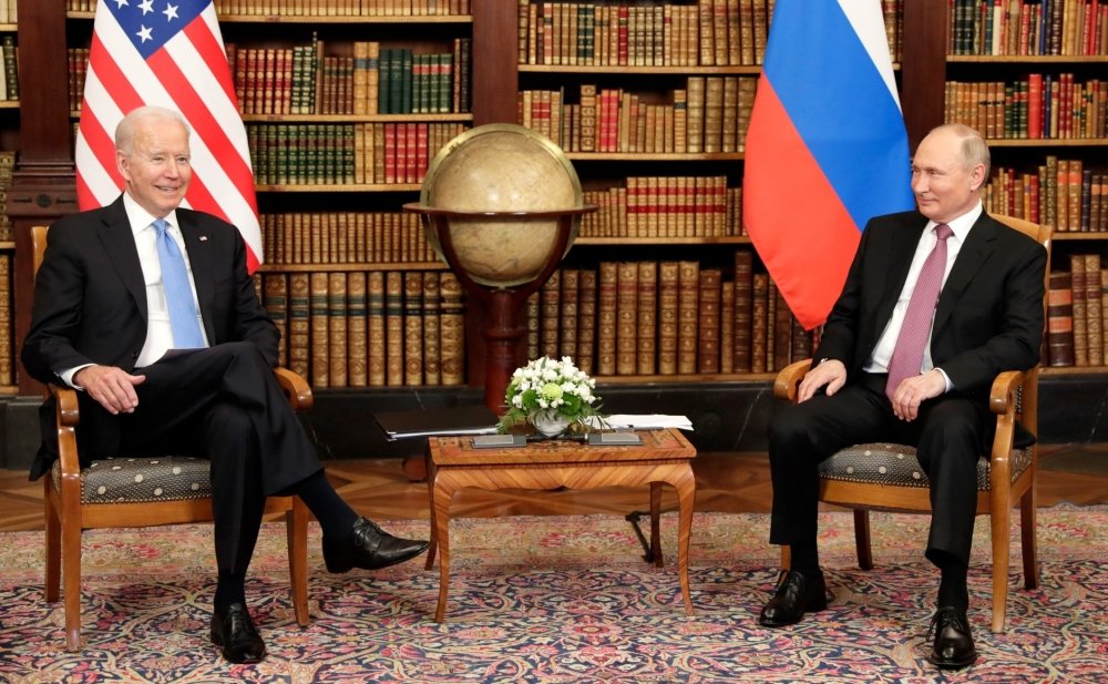 President Joe Biden sits with Russian President Vladimir Putin, 16 June 2021