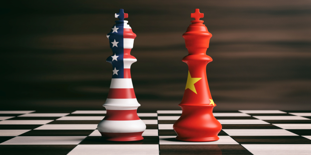 US and Chinese Chess Pieces Facing Each Other