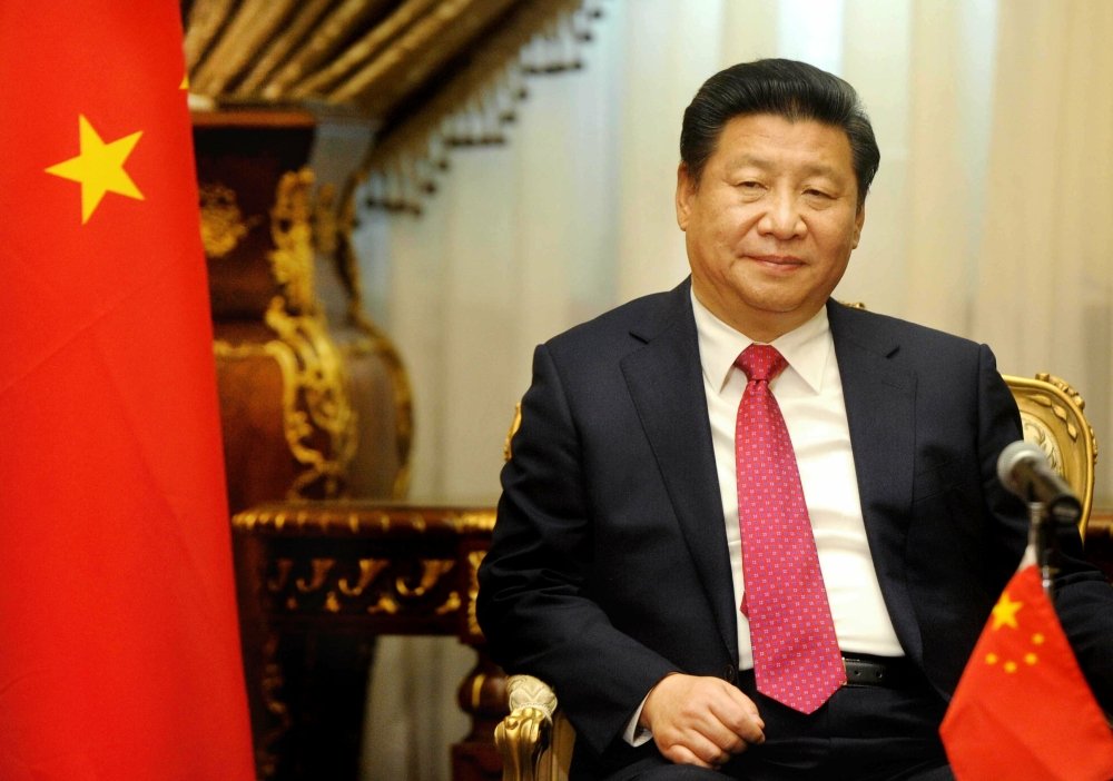Xi Jinping sits in a meeting in Beijing in December 2020