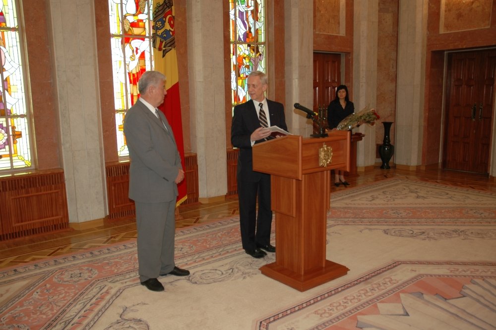 Picture of William H. Hill (right) with Vladimir Voronin, taken by the Moldovan Presidential Administration, June 2006. Hill was receiving an award at the end of his term as OSCE Head of Mission