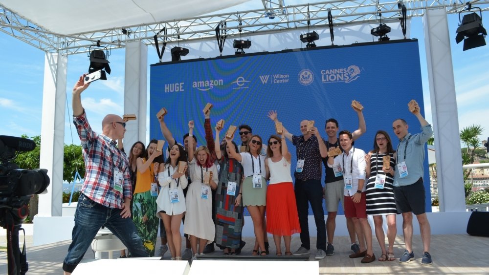 Three winning teams celebrate the results at the Cannes Hackathon.