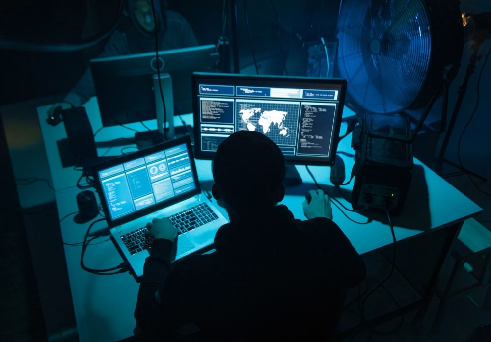 Hacker at computer