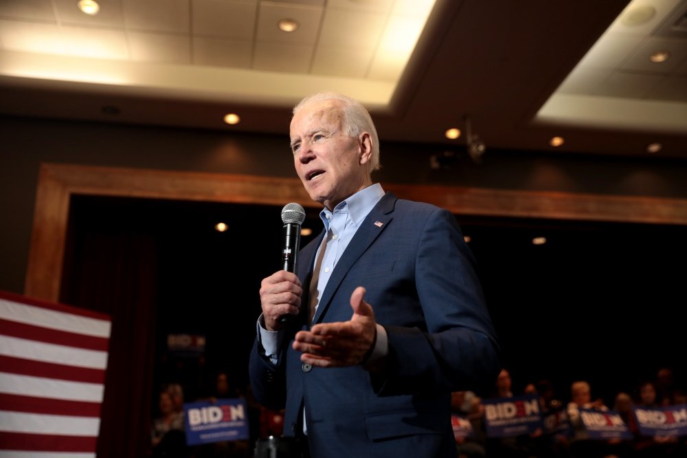 Joe Biden Talking into a Microphone at a campaign event 