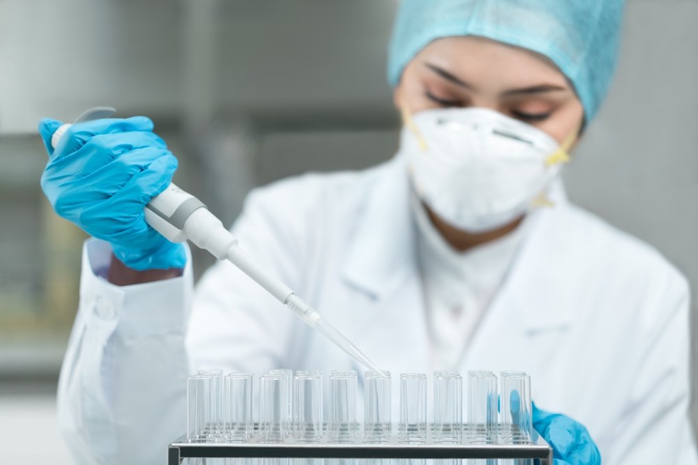 Young female scientist working in the laboratory