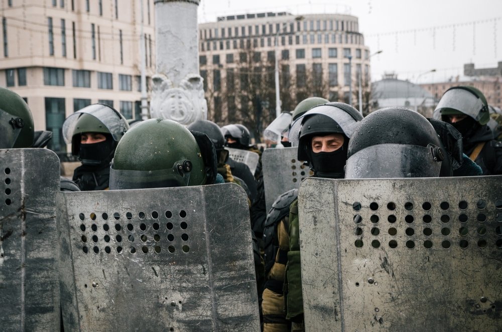 Special police unit with shields against protesters. Belarusian people participate in the protest against Lukashenko and the current authorities.