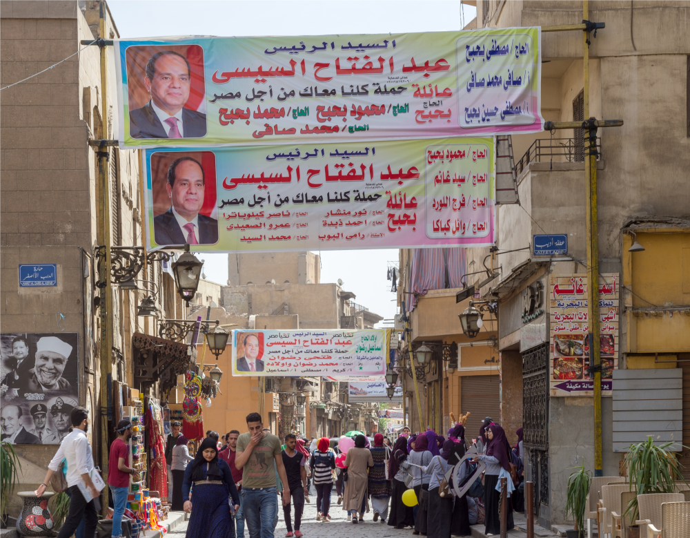 Banners supporting current Egyptian president Abdel-Fattah El-Sisi for a second term for the presidential elections at crowded Al Moez Street, Gamalia district