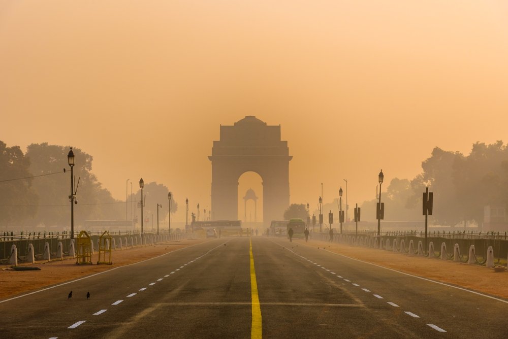 Silhouette of triumphal arch style war memorial during smoggy winter morning