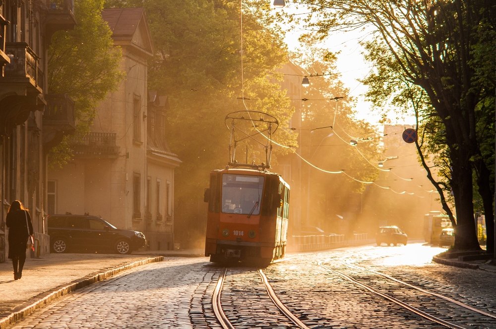 Old orange tram in backlight. Lviv (Lvov), Ukraine