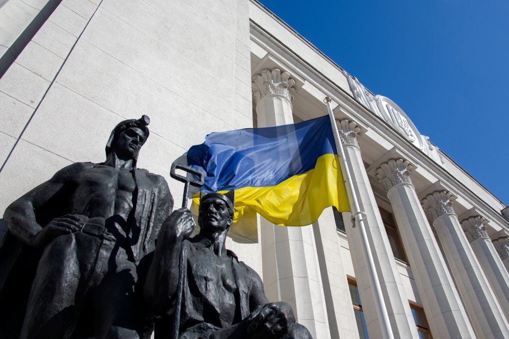 lag in front of the facade of the building of the Verkhovna Rada of Ukraine, June 2019