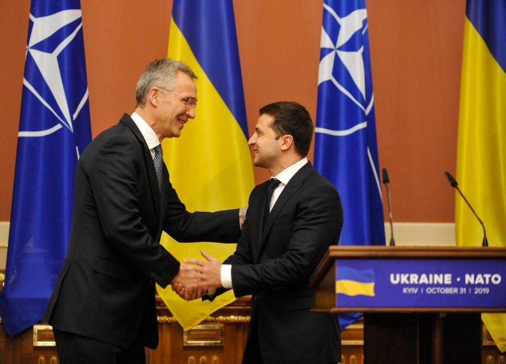 KYIV, UKRAINE- October 31, 2019: NATO Secretary General Jens Stoltenberg speaks to Ukrainian President Volodymyr Zelensky after the Ukraine-NATO Commission meeting