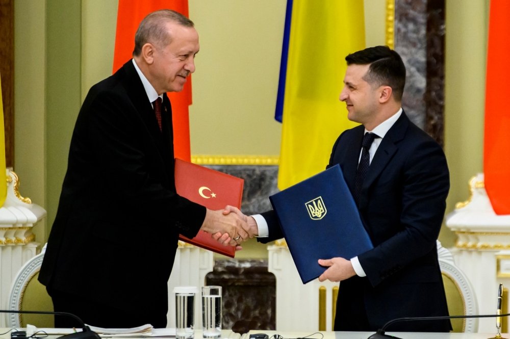 Turkish President Recep Erdogan and Ukrainian President Volodymyr Zelensky shake hands in Kiev, Ukraine February 3, 2020