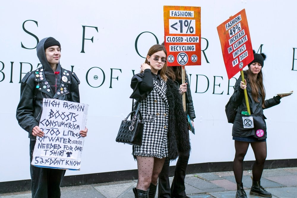 People protesting against unsustainable fast fashion in London