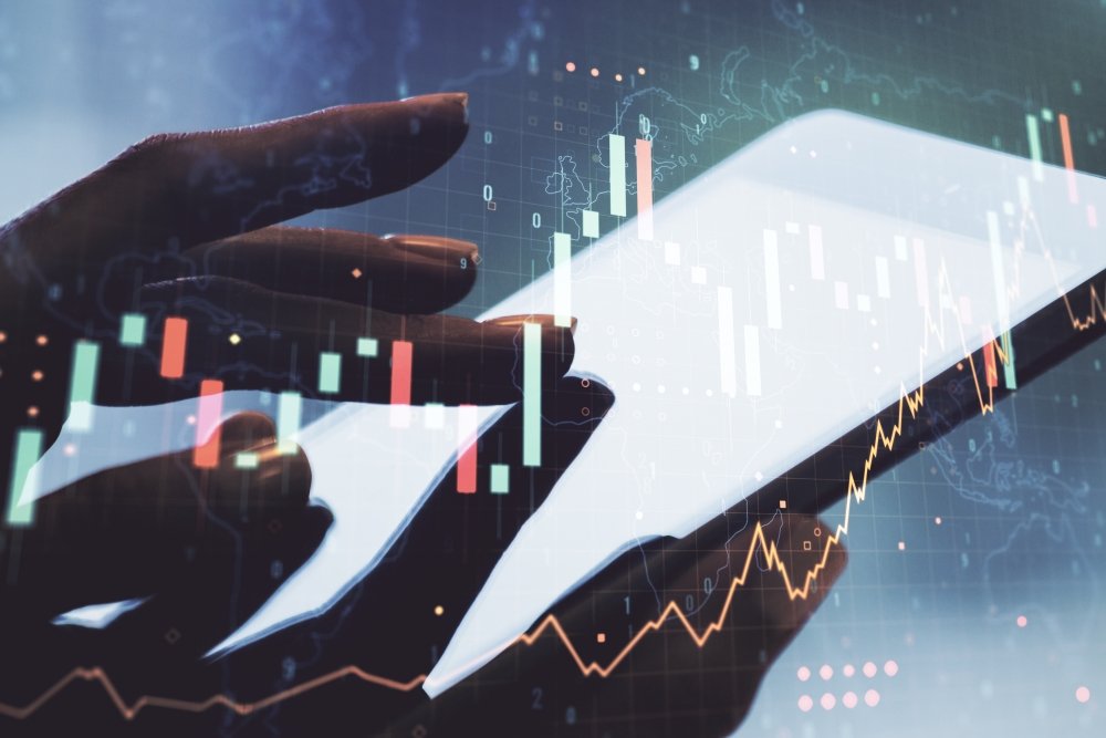 Abstract creative financial graph with world map and with finger clicks on a digital tablet on background, forex and investment concept. Multiexposure