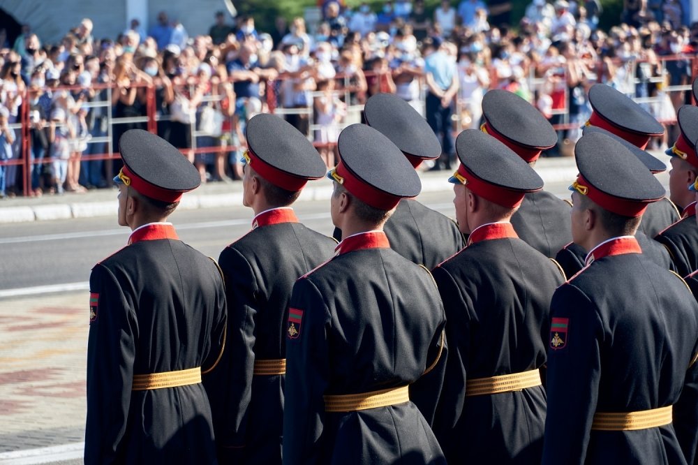 Tiraspol, Transnistria - September 2, 2020: military parade dedicated to the 30th anniversary of independence, soldiers in full dress uniforms, Russian text on Chevron - armed forces of Transnistria