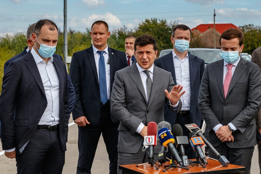  September 25, 2020: President of Ukraine Volodymyr Zelensky (С) answers questions of journalists after inspecting M24 highway as part of working visit to the Zakarpattia region.