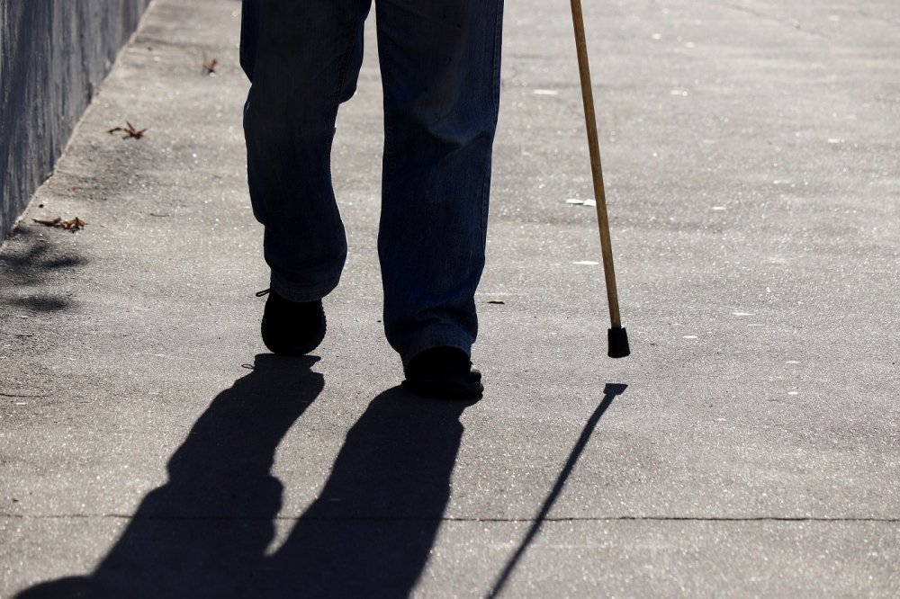 Man walking with a cane