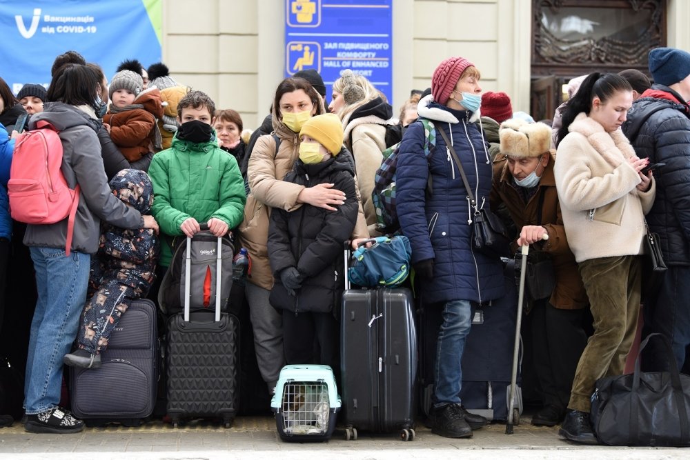 Lviv, Ukraine - February 26, 2022. People in railway station of western Ukrainian city of Lviv waiting for the train to Poland.