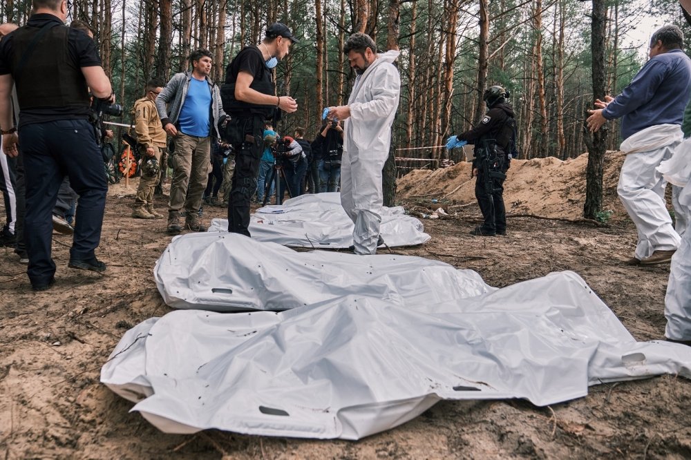 Izyum, Kharkiv Oblast, Ukraine. September 17, 2022. Exhumation of 450 bodies from a mass grave. Most of the victims were tortured and killed during Russian occupation.
