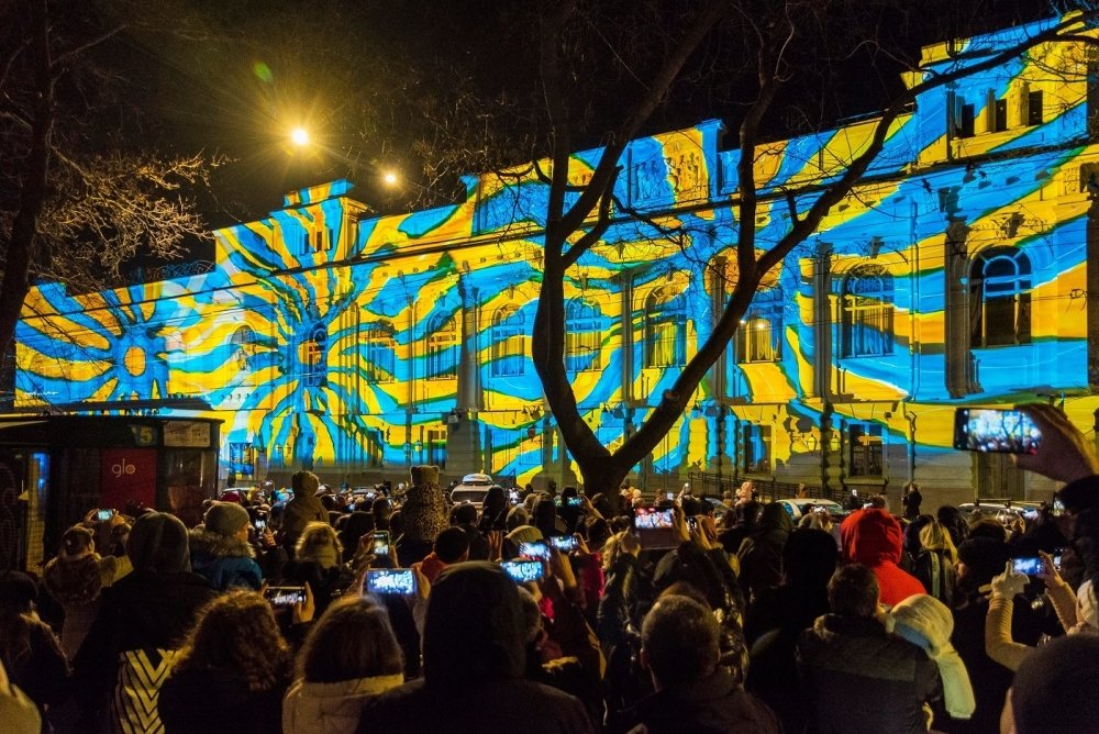 Blue and Yellow projection on a building