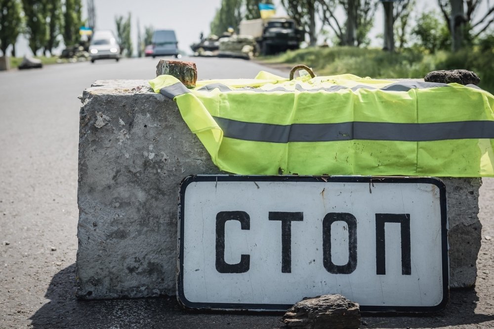 Checkpoint with word "Stop" written in Cyrillic